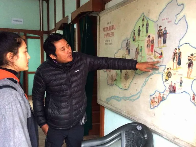 Guide Teiso with Noëmi in Arunachal Pradesh. (2018) Image