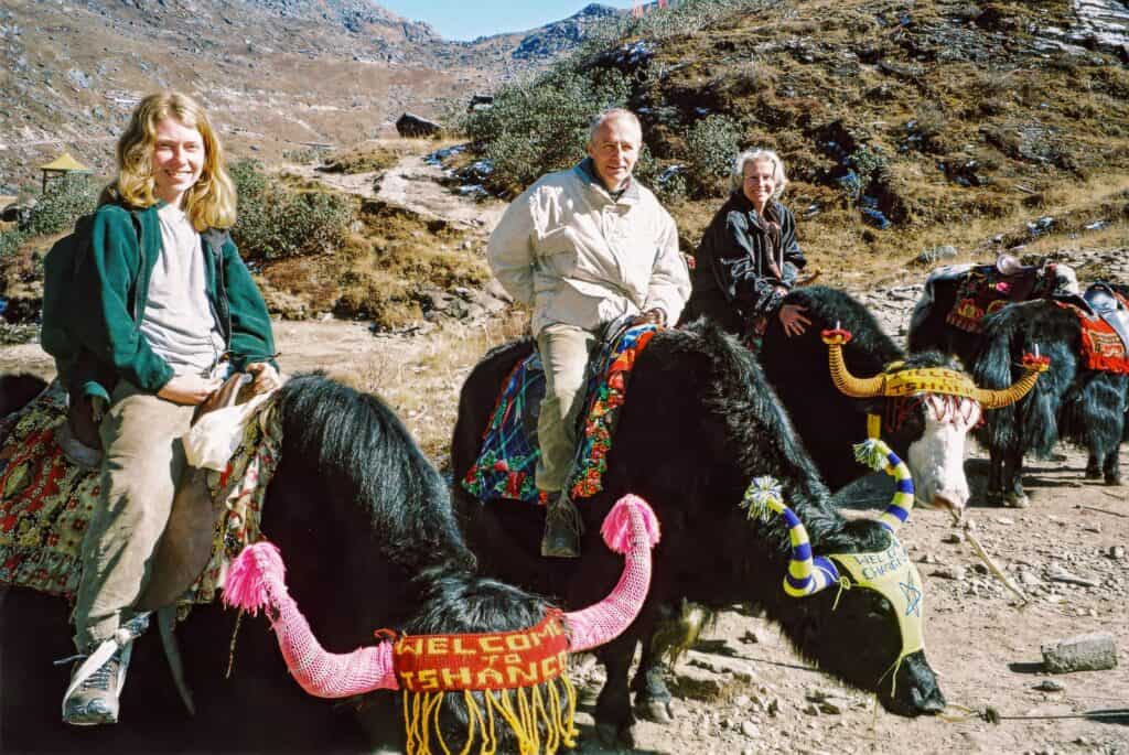 Yak-riding along the shores of Tsomgo Lake